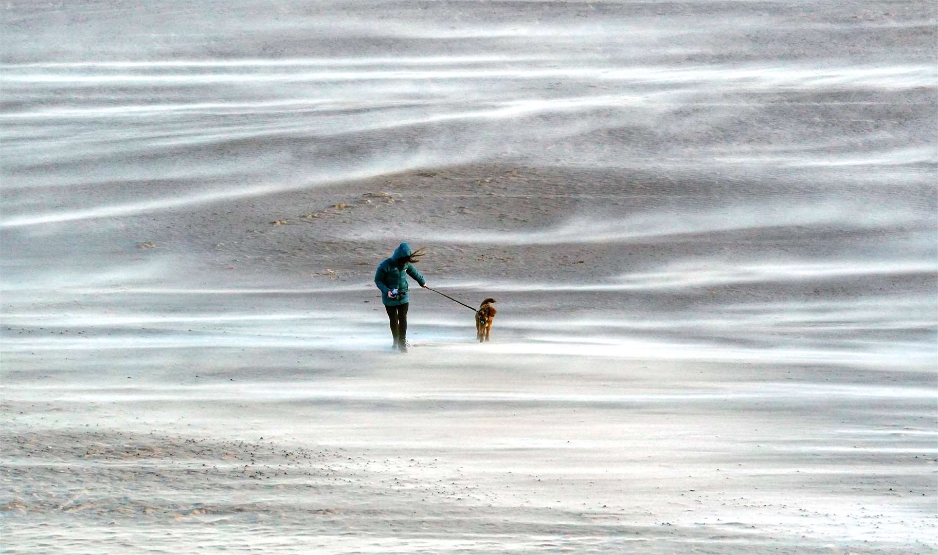 In mid-February, Storm Otto left walkers on Tynemouth beach surrounded by sand whipped up by the strong winds (Owen Humphreys/PA)