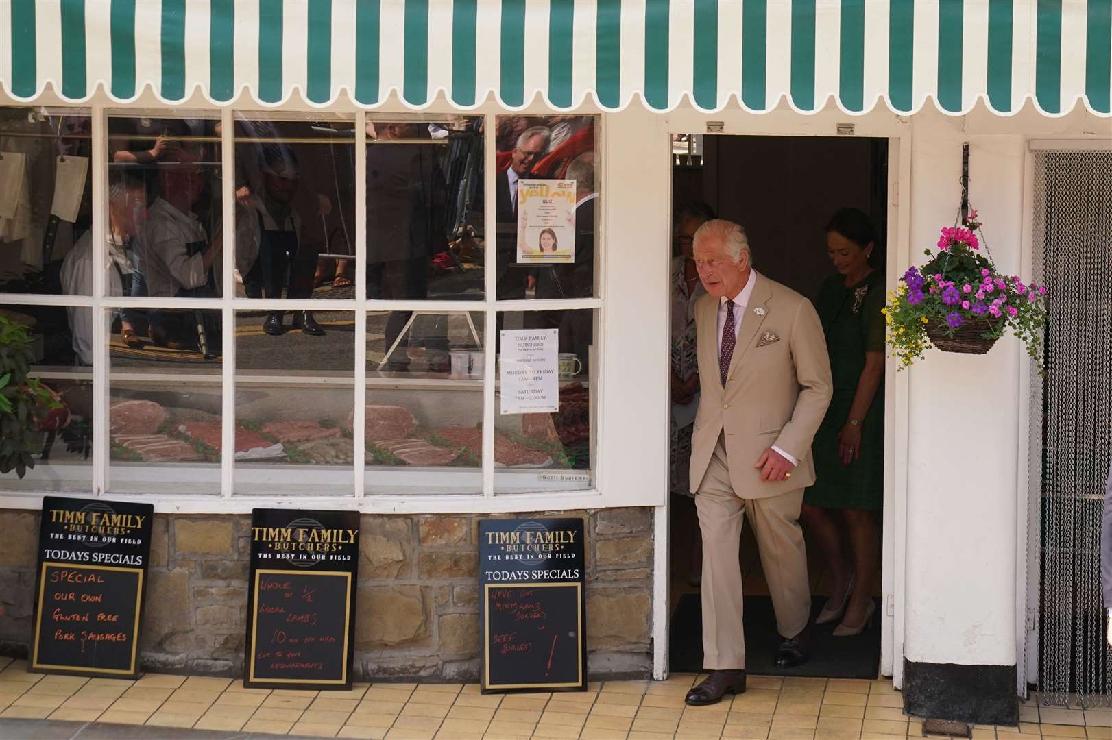 Charles visited a butcher’s shop during his walkabout in the market town (Owen Humphreys/PA)