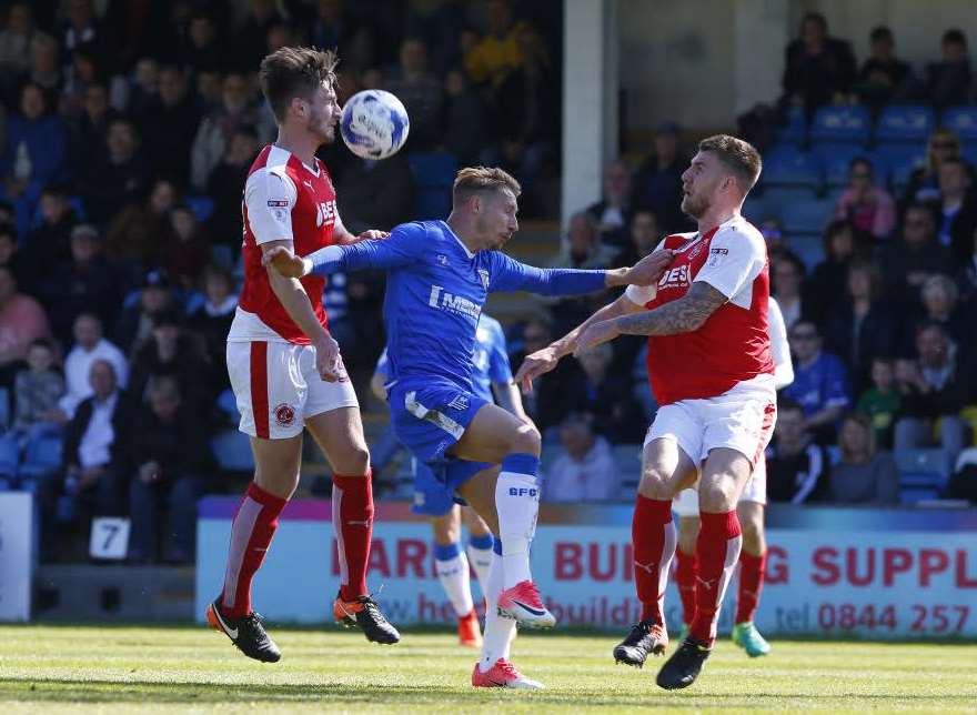 Lee Martin battles for the ball Picture: Andy Jones