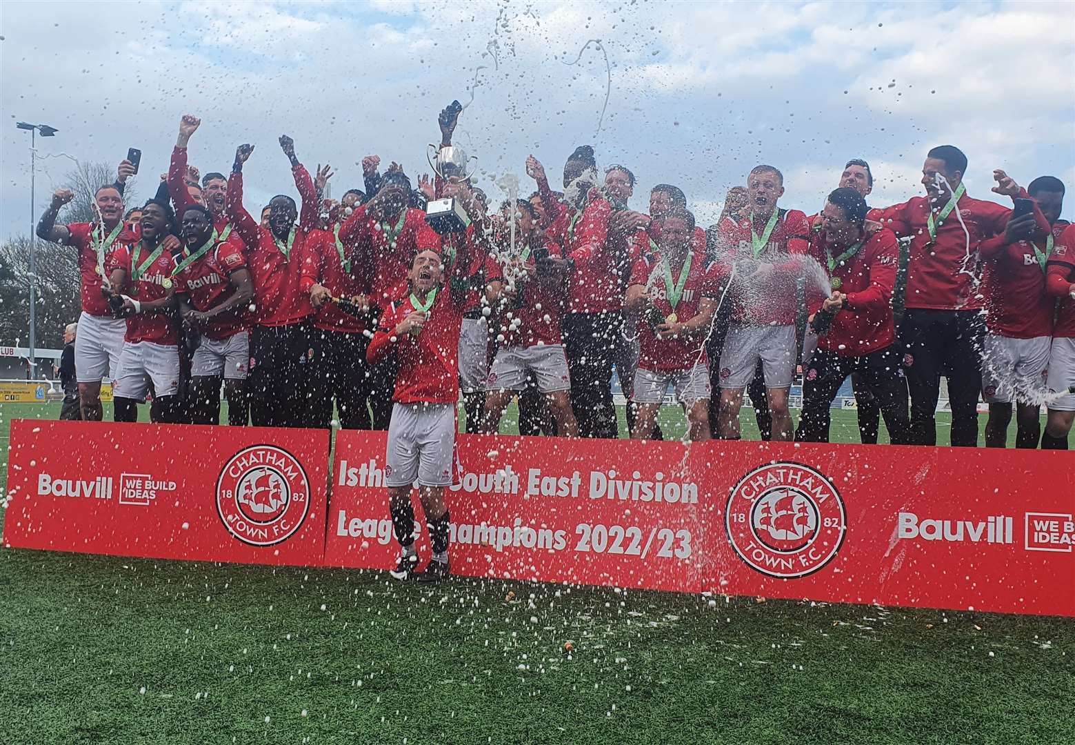 Captain Jack Evans gets the celebrations going after Chatham are crowned Isthmian South East champions