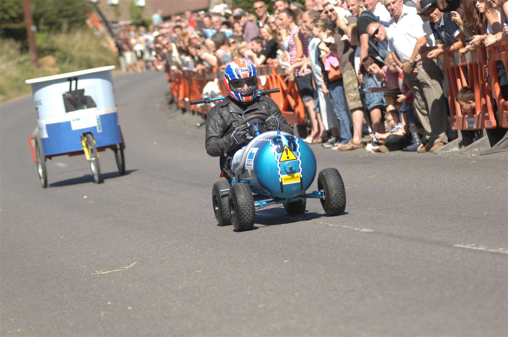 Huge crowds gathered to watch their fellow residents tear down Forge Hill. Picture: Gary Browne