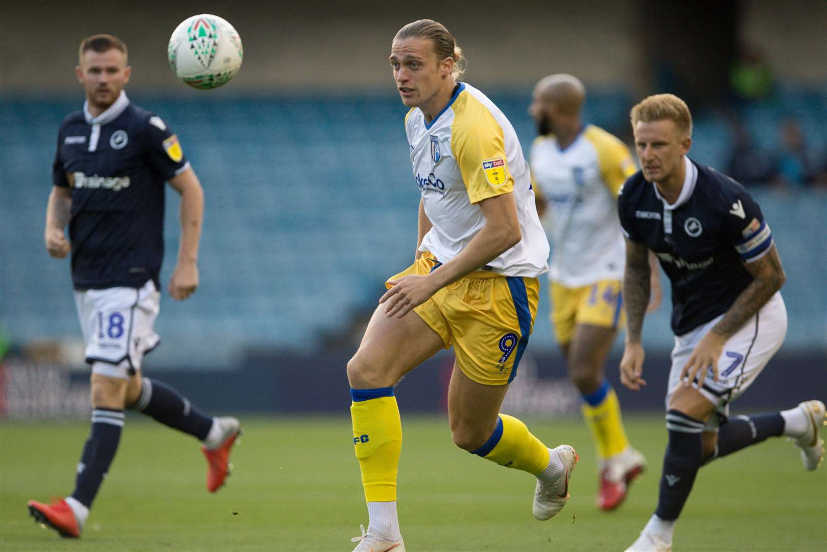 Tom Eaves gets away from Millwall's Byron Webster Picture: Ady Kerry