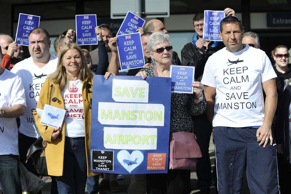 Campaigners Ruth Bailey, left, and Jenny Milligan, centre, wave off the final KLM flight with other protestors