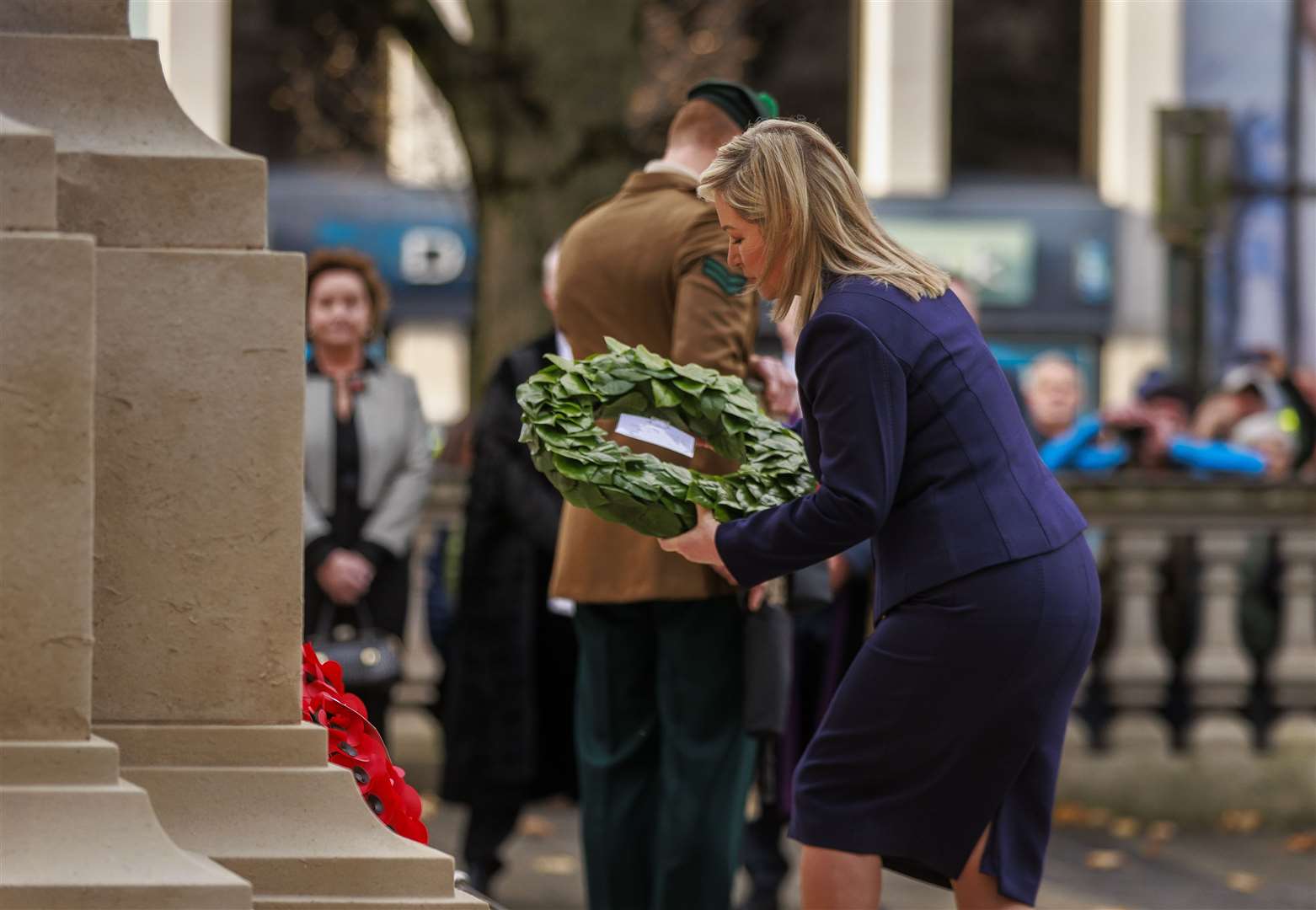 Michelle O’Neill lays a wreath during the Remembrance Sunday service at Belfast City Hall (Liam McBurney/PA)