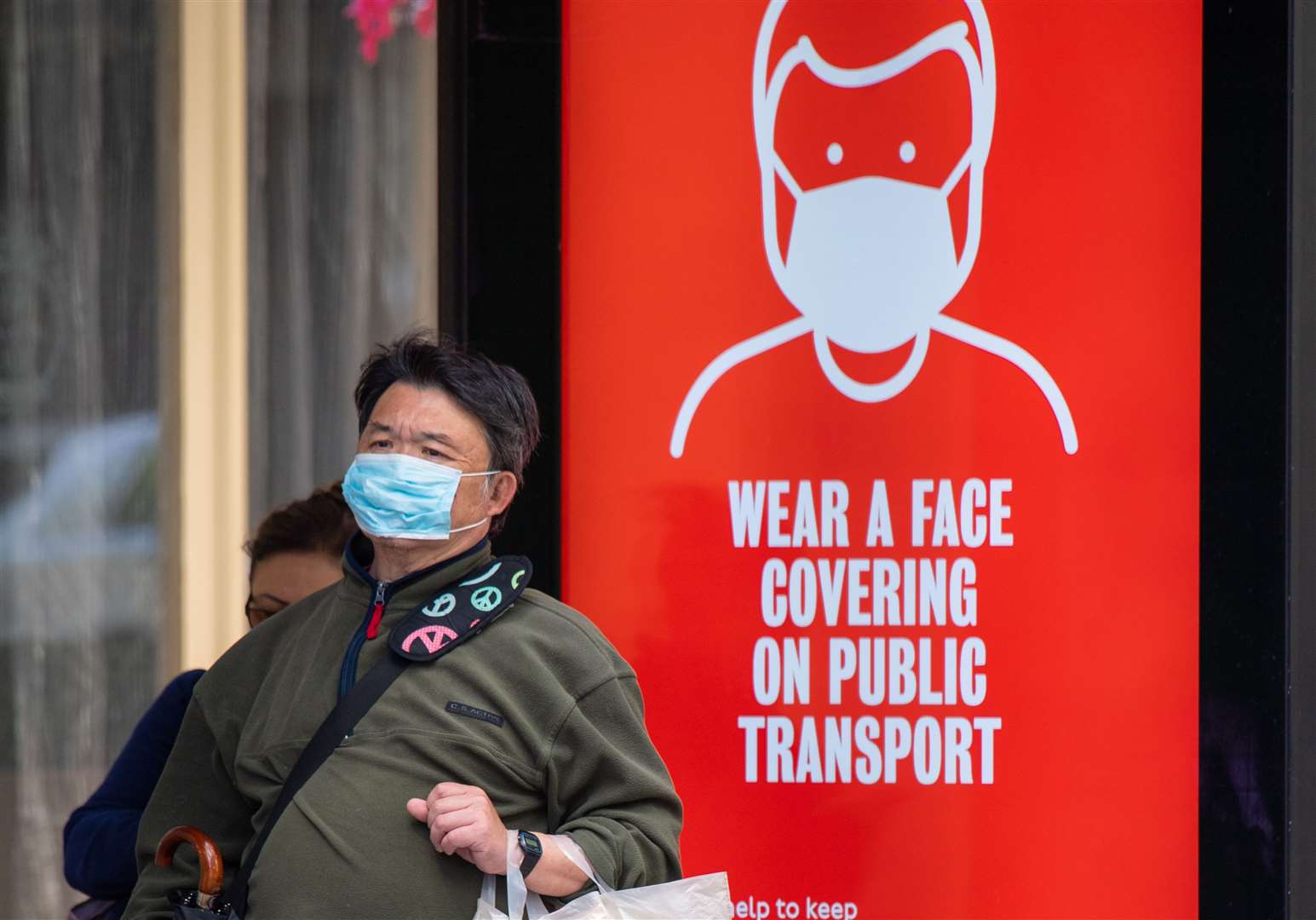 Face coverings are already mandatory on public transport in England (Dominic Lipinski/PA)