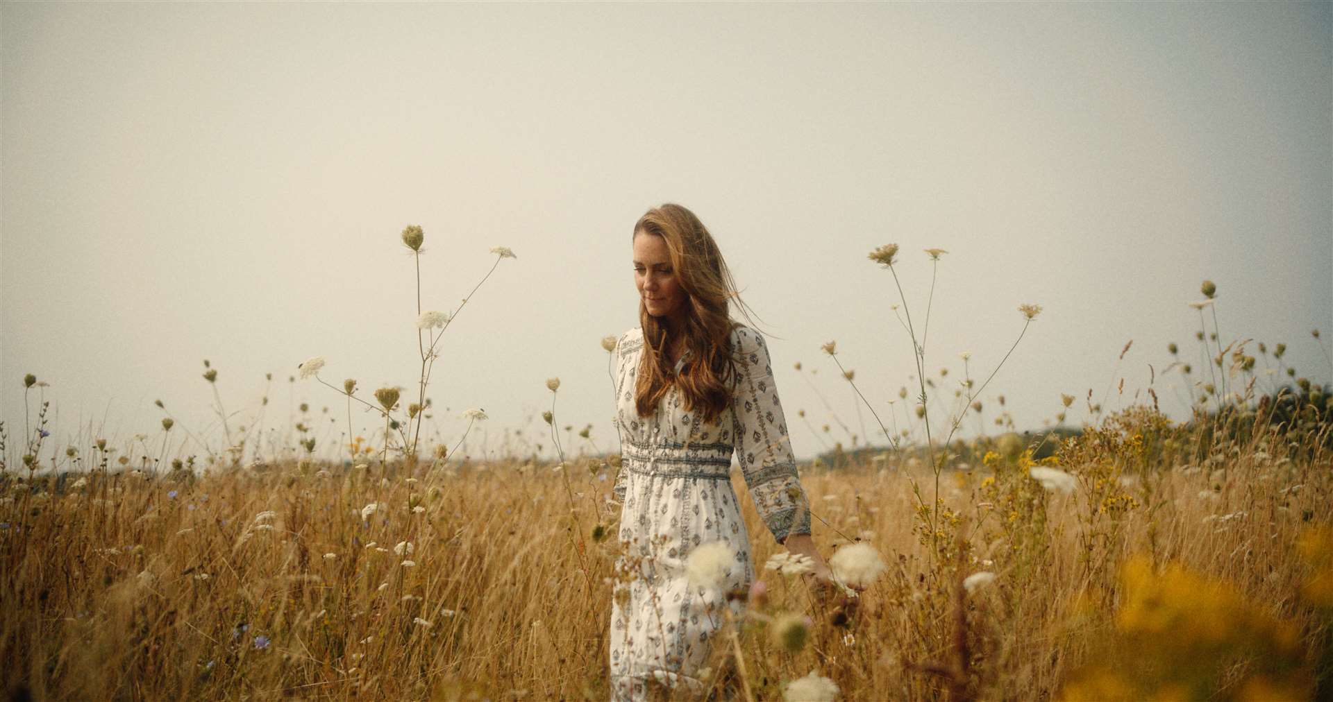 The Princess of Wales walking through a meadow in a video released in September (Will Warr/Kensington Palace/PA)