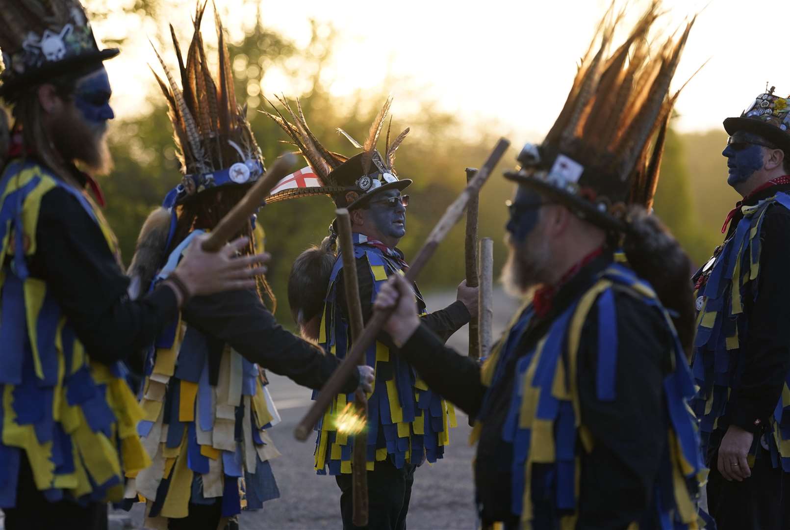 Members of the Hook Eagle Morris Men perform outside the Shack Cafe near Hook in Hampshire (Andrew Matthews/PA)