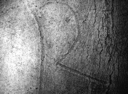 The letter R on the Roman curse scroll as seen through a scanning electronic microscope. Picture: Paul Tritton