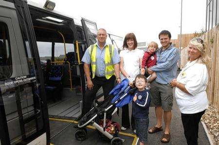 Bus driver Phil Page with Jo and Simon Wakeman with sons Oliver, five, and Toby, two. Picture: Chris Davey