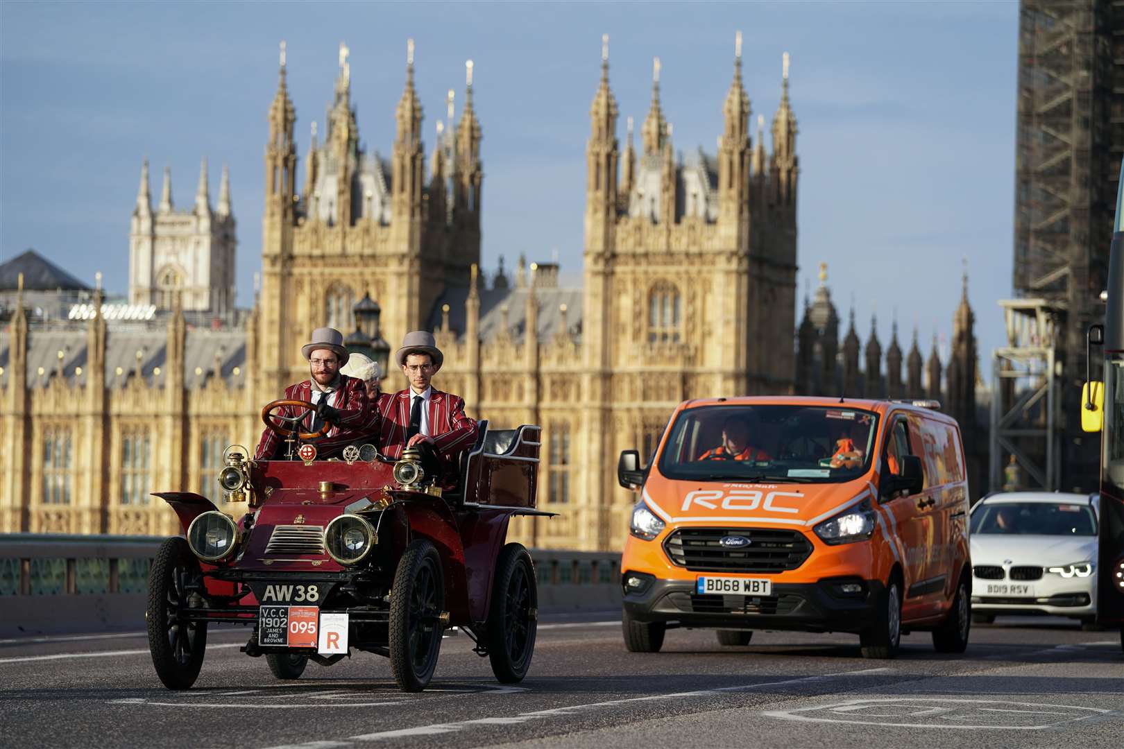 Participants are followed by an RAC breakdown vehicle as they drive over Westminster Bridge (Kirsty O’Connor/PA)