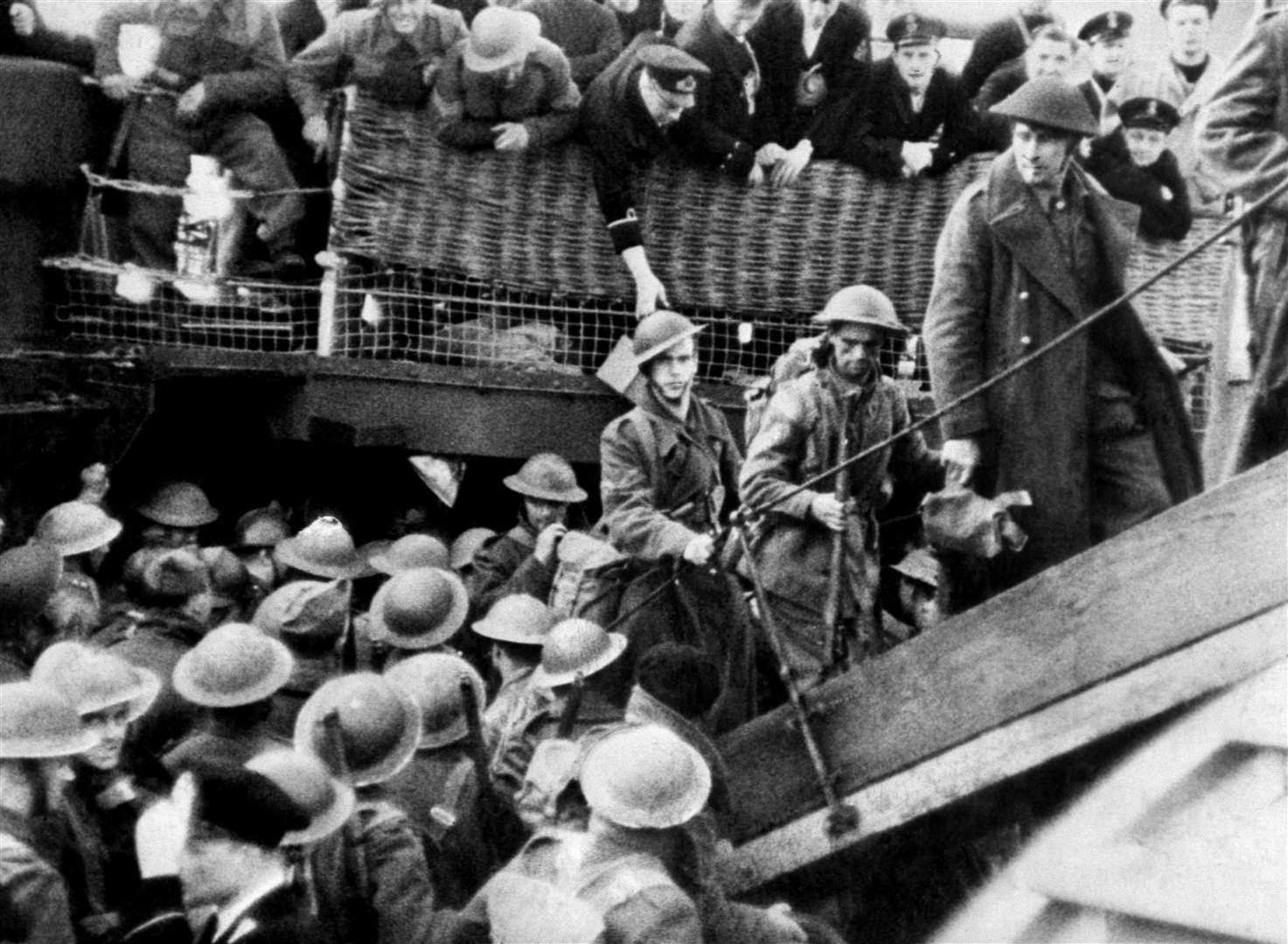 British soldiers on their return to England after being evacuated from the beaches of Dunkirk (PA Archive)