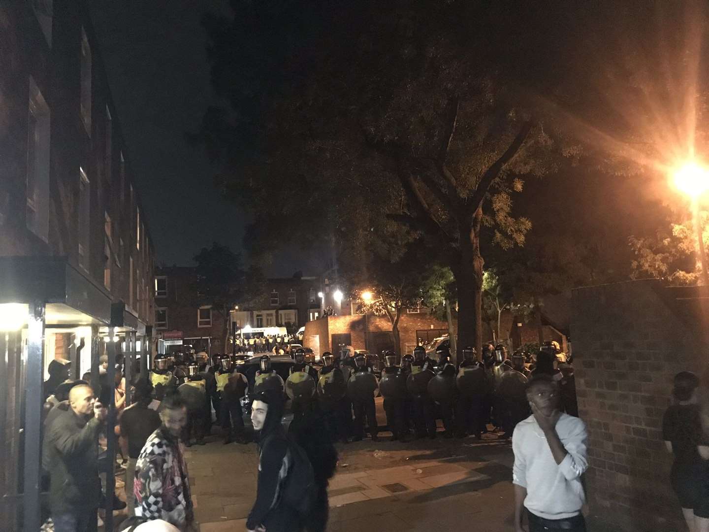 Police disrupted an unlicensed music event in Riverton Close in West Kilburn, London (PA Media)