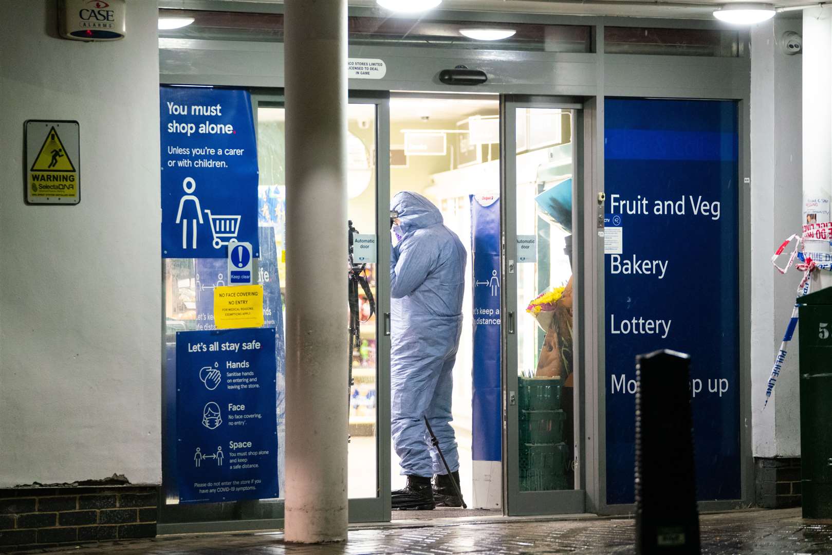 Police at the scene of a stabbing incident on Willesden Lane, in Kilburn (Dominic Lipinski/PA)