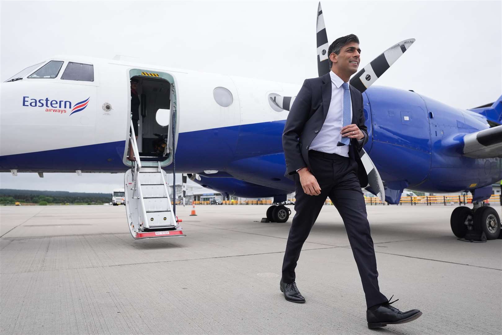 Prime Minister Rishi Sunak arrives at Inverness Airport, Scotland, while on the General Election campaign trail (Stefan Rousseau/PA)