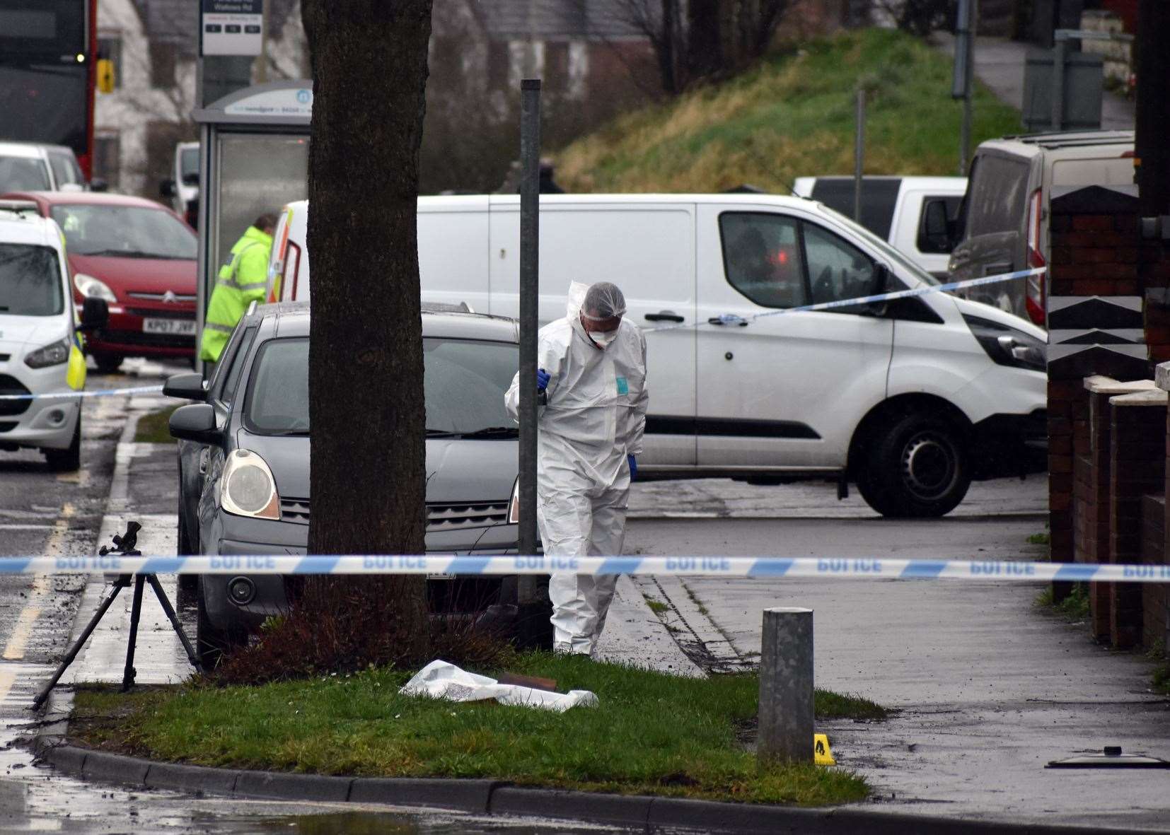 Police at the scene last February (Matthew Cooper/PA)