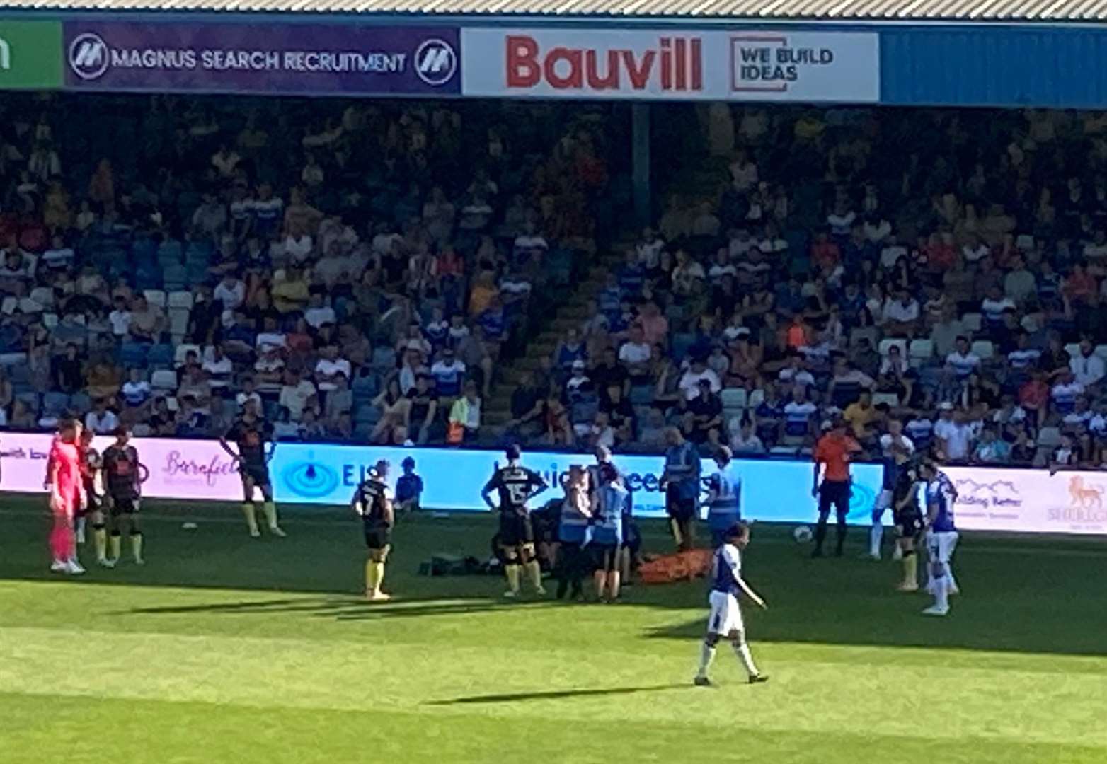 Harrogate Town's Sam Folarin receives treatment after suffering breathing difficulties at Priestfield