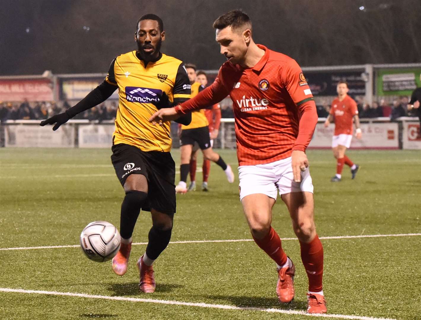 Joe Martin is put under pressure by Roarie Deacon in Ebbsfleet's defeat at Maidstone Picture: Steve Terrell