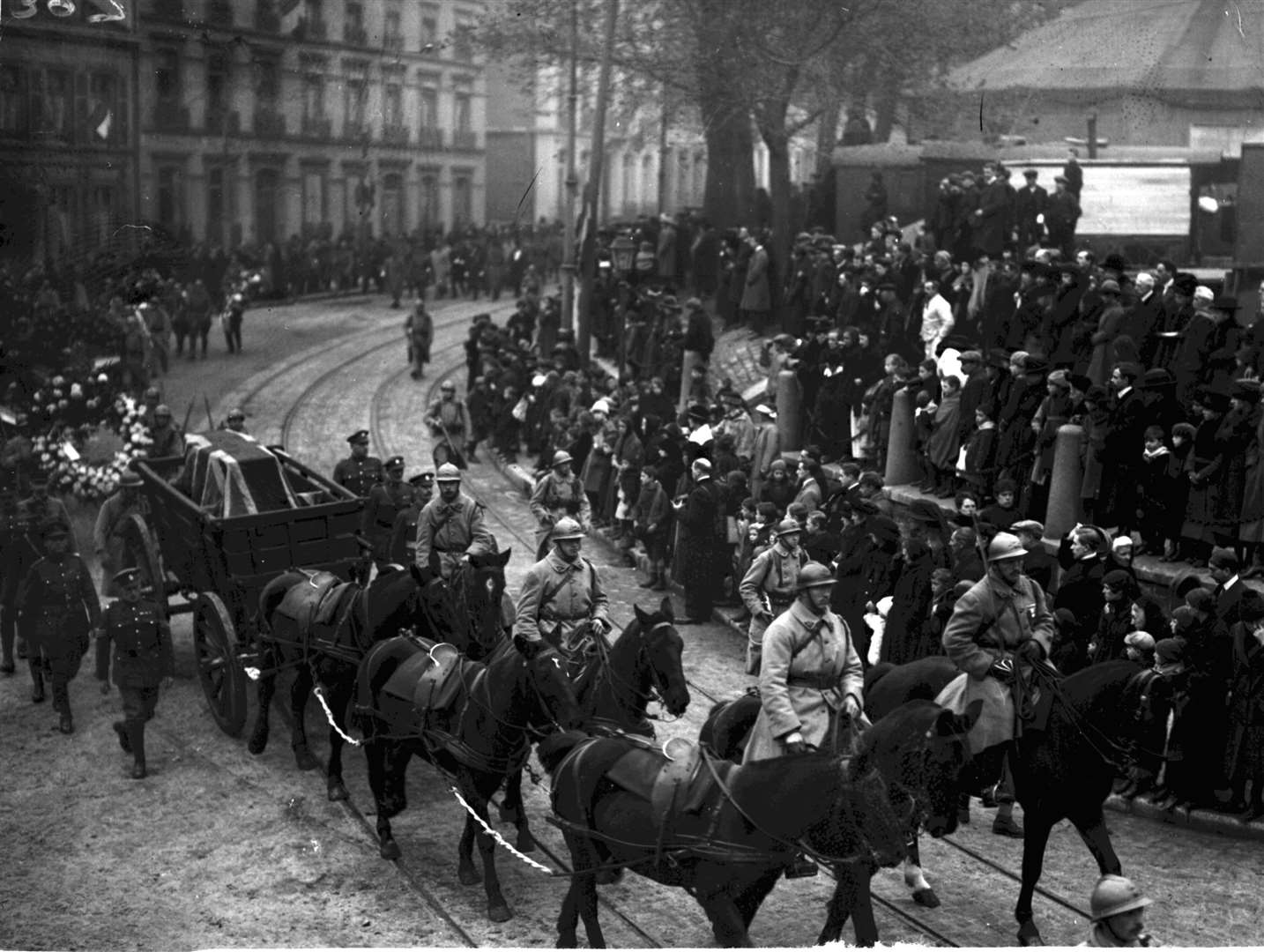 Crowds lined the streets of Boulogne in France as the coffin carrying the Unknown Warrior begins its journey to Westminster Abbey (PA)