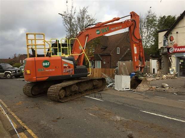 The digger ploughed into the front of the shop