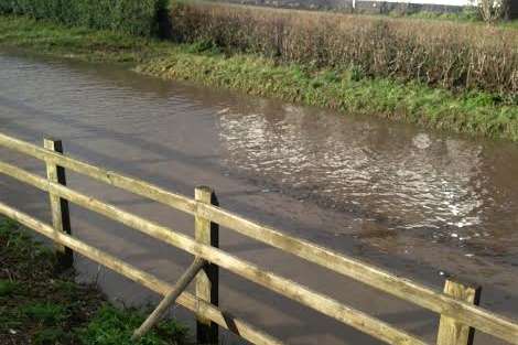 This road in Ryarsh resembles a river after downpours