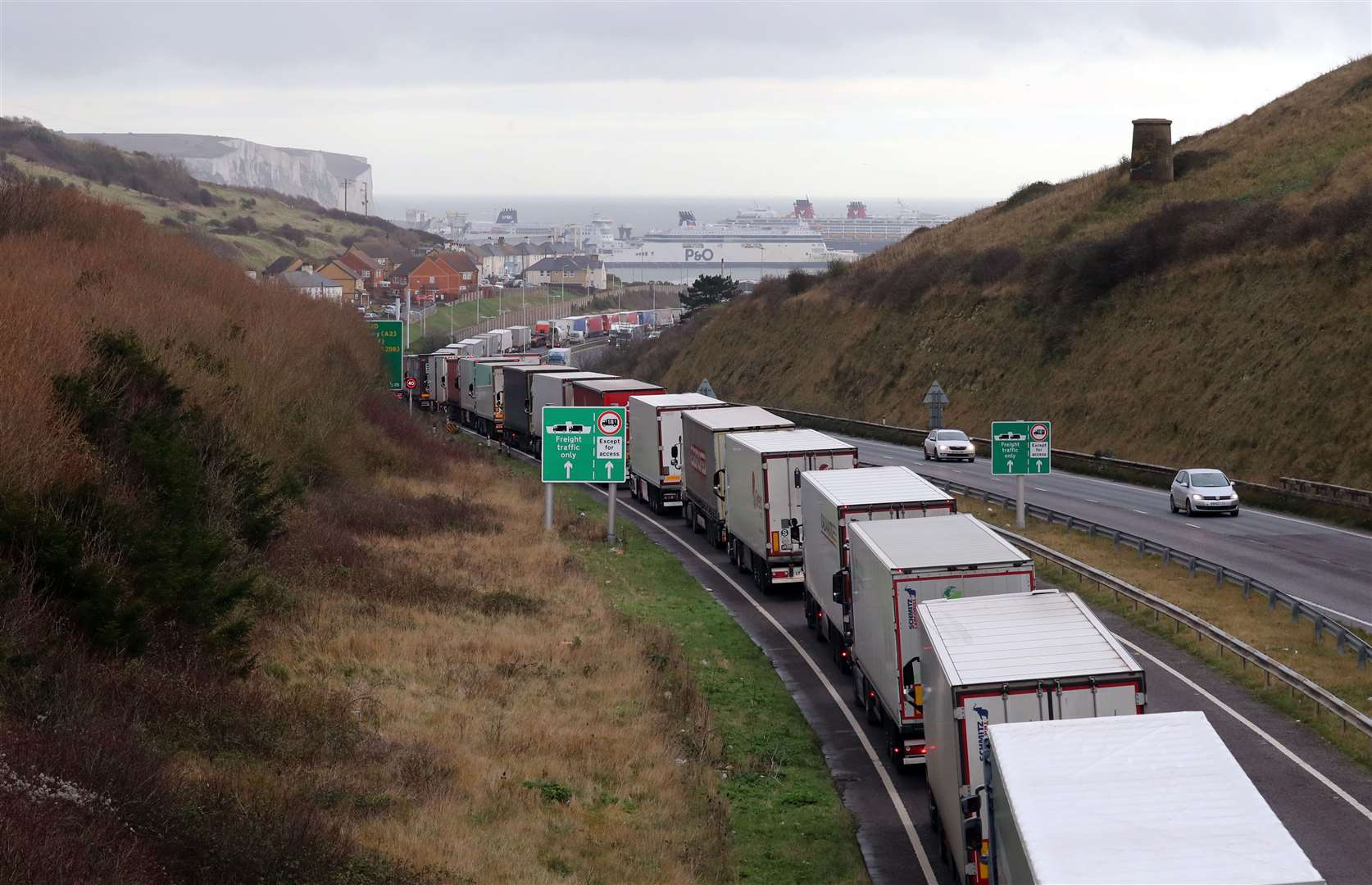 Lorries queue for the Port of Dover along the A20 in Kent (Gareth Fuller/PA)