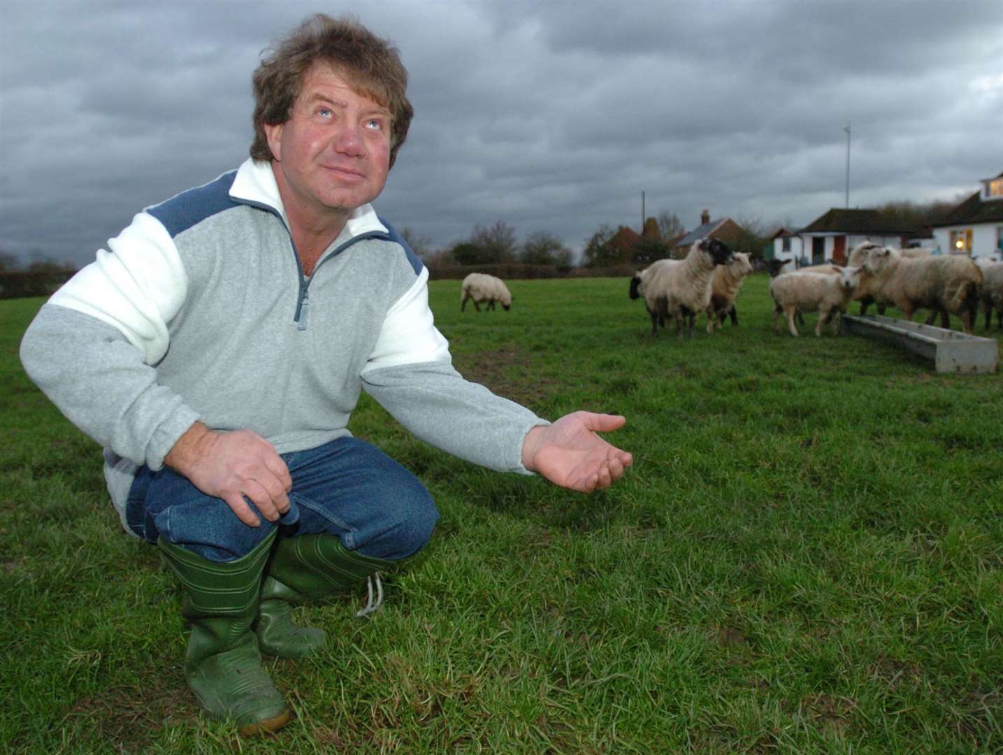 Lester Gosbee, sheep farmer and amateur forecaster, testing the weather