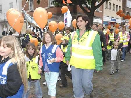 The walking bus group as they march through Canterbury. Picture: Chris Davey.