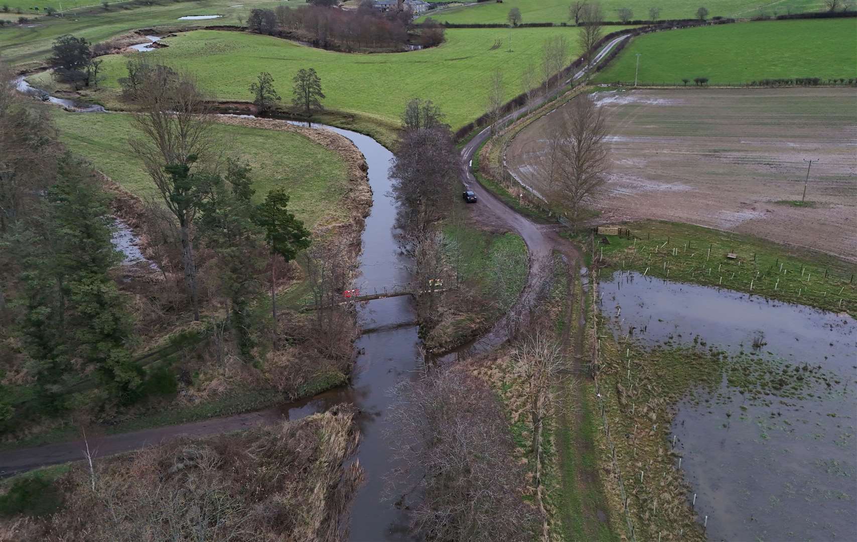 The river was swollen during Storm Darragh (Owen Humphreys/PA)