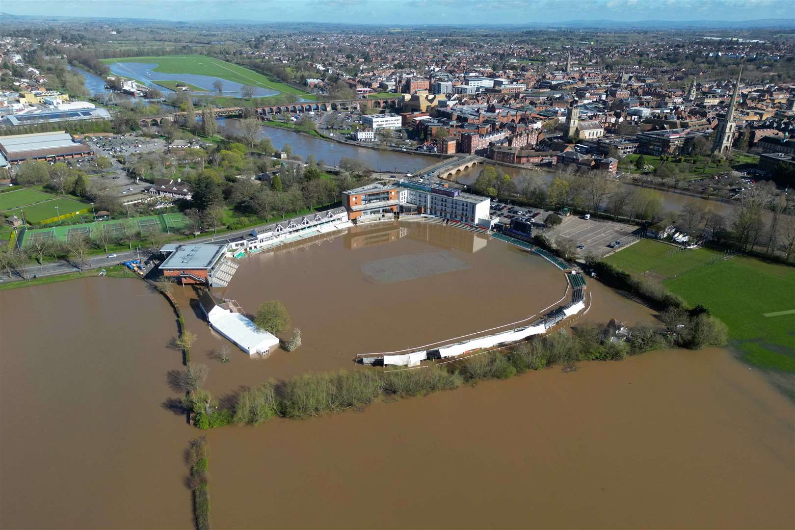 An aerial view showing a flooded New Road Cricket Club, home of Worcestershire CCC, in Worcester at the end of March (Jacob King/PA)