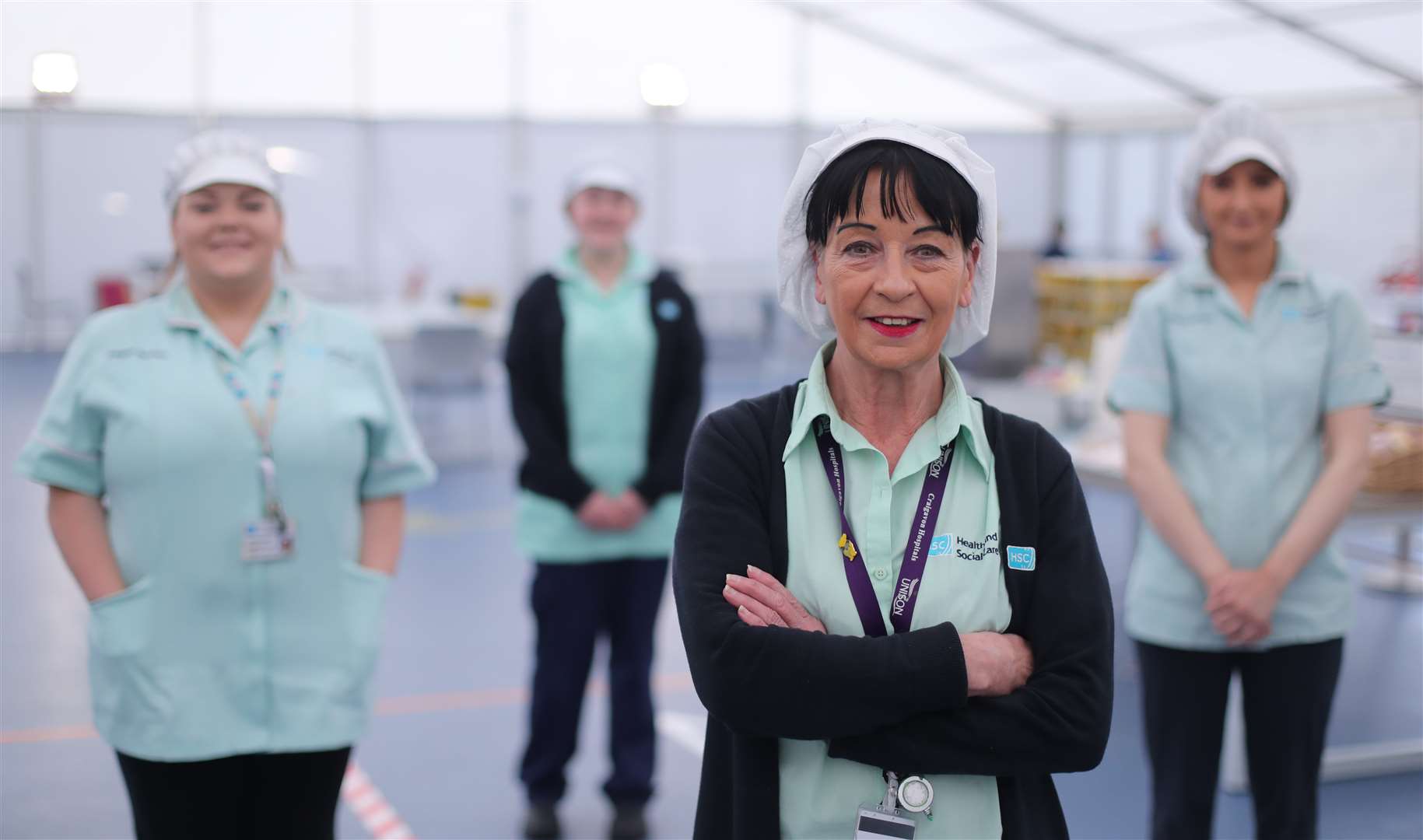 Catering staff, from left, Kayleigh Timms, Caroline Porter, Carmel Lennon and Tanya White at Craigavon (Niall Carson/PA)