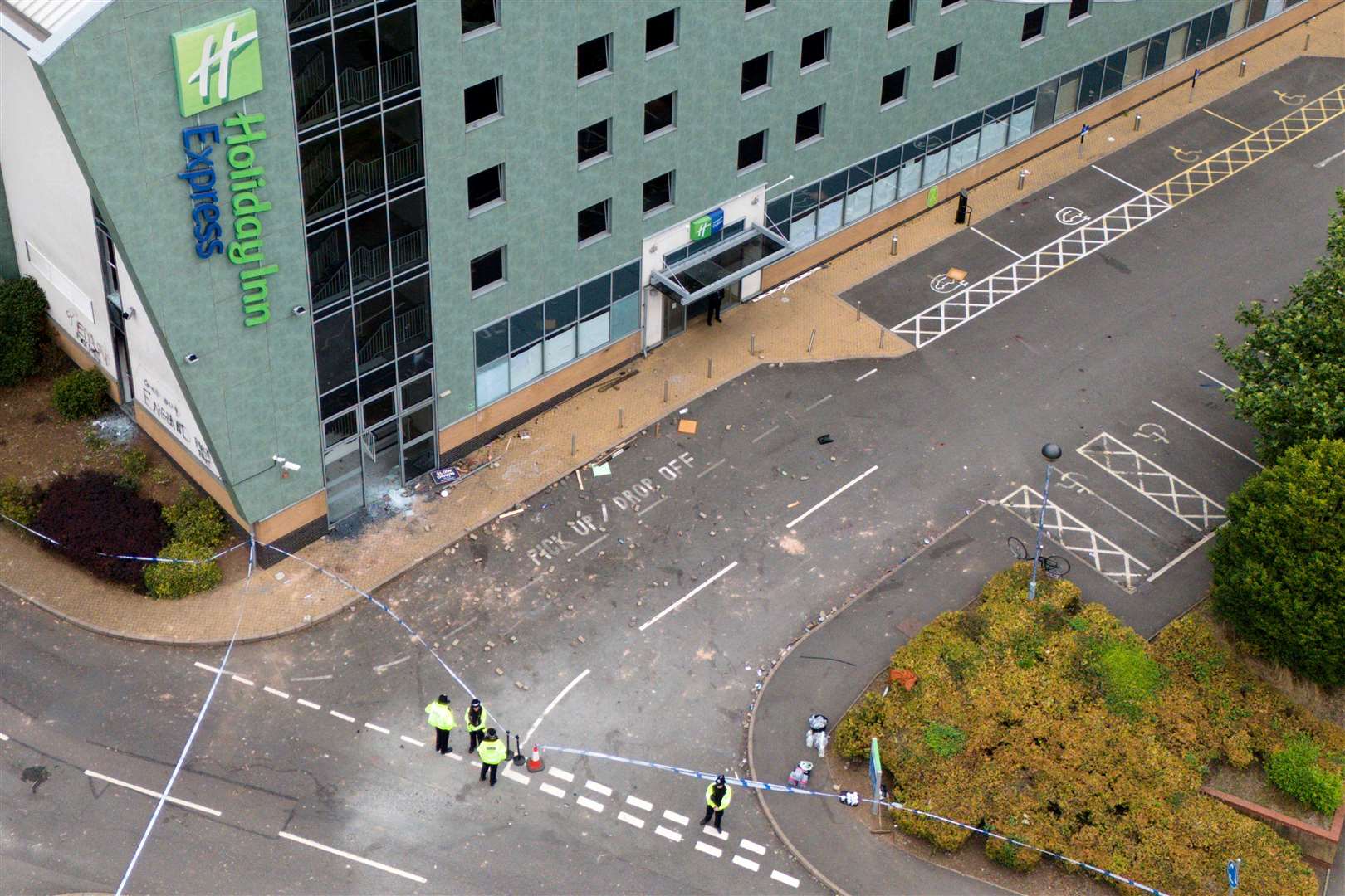 A drone view of police at the scene the day after the attack (Jacob King/PA)