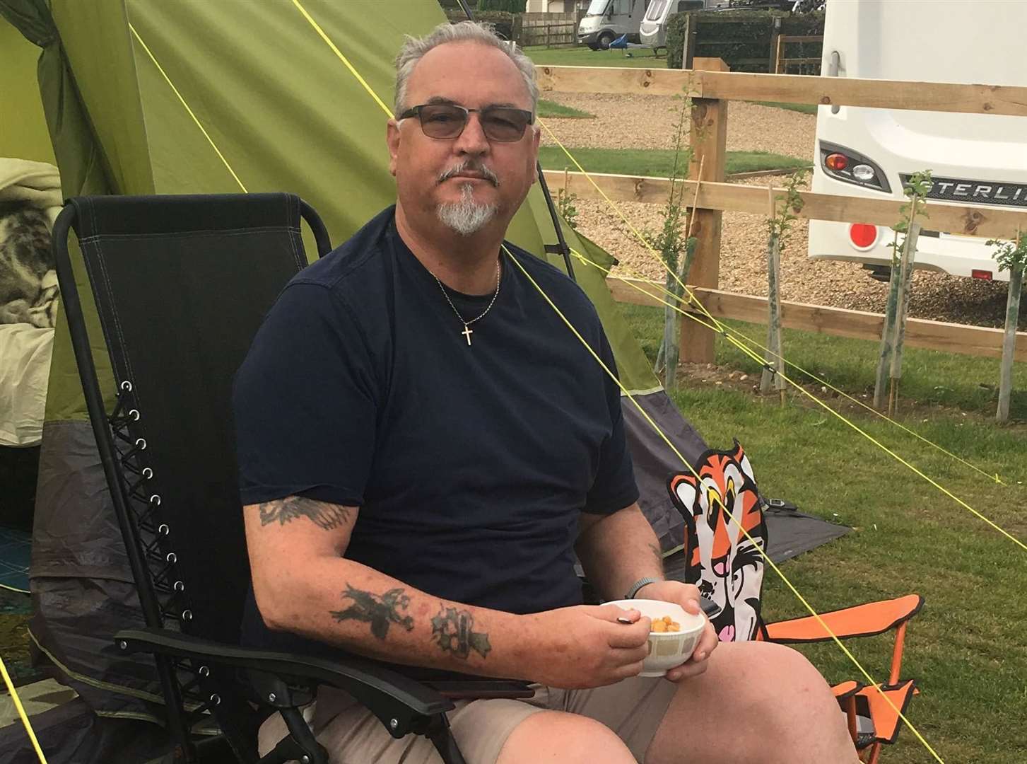 Dave Manser enjoying a camping trip to Norfolk to celebrate his 66th birthday a week before his death