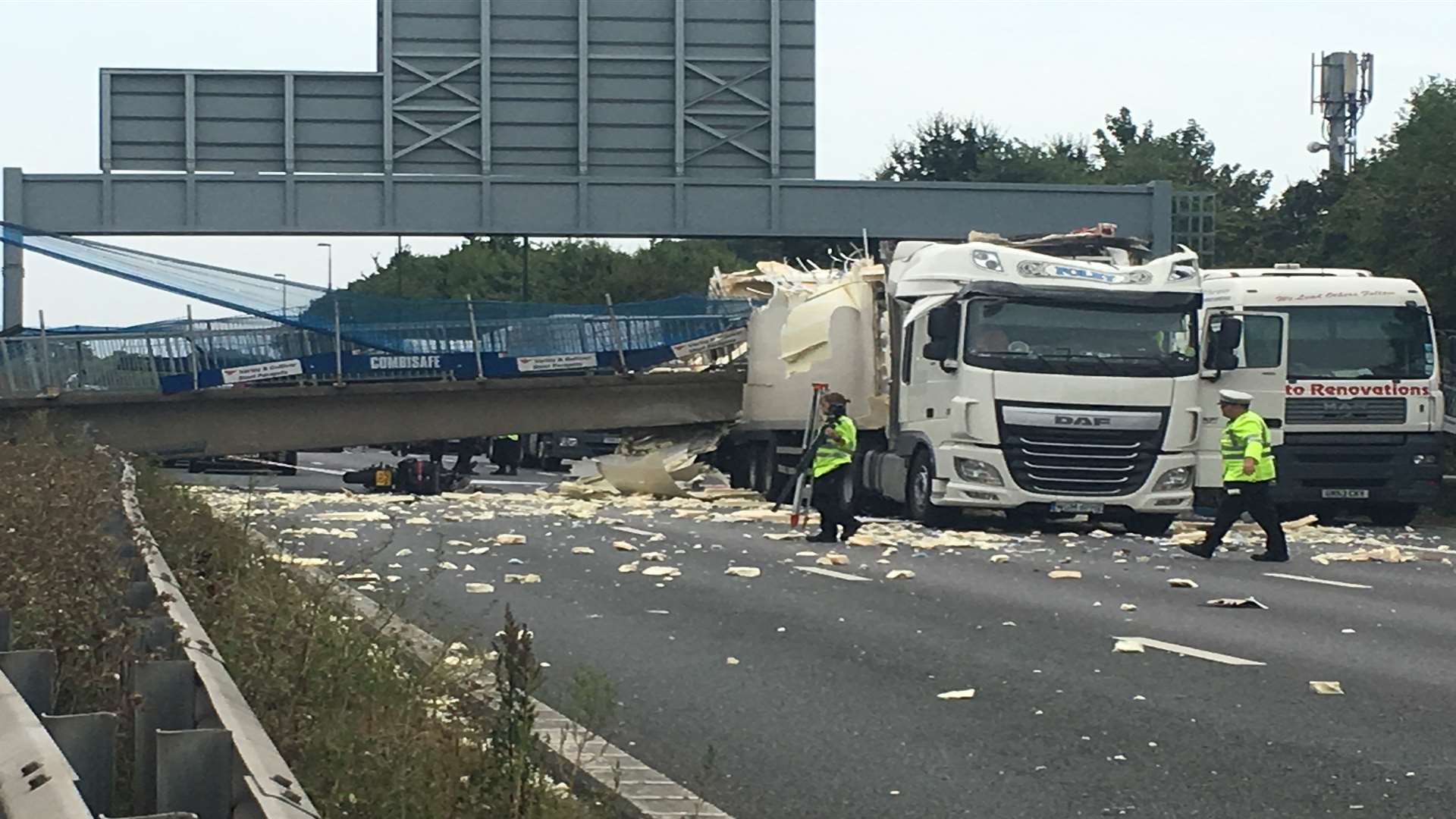 A closeup of damage caused to a pedestrian footbridge on the M20