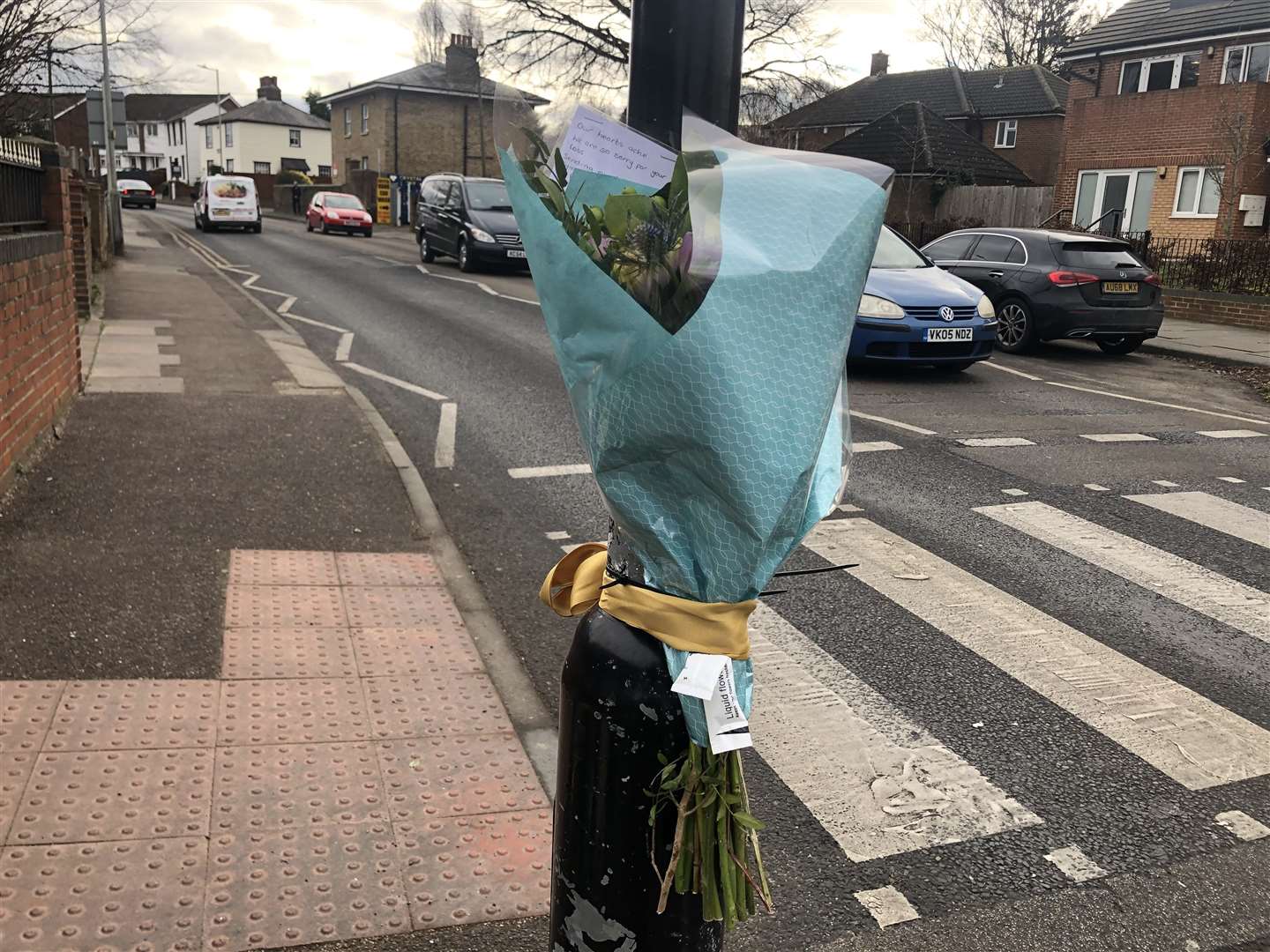 Floral, candle and basketball tributes have been laid in Vale Road