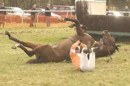 SEEING STARS: Jockey Paul Blagg and his horse Off the Planet part company in the second race at Charing last Sunday. Picture: DAVE DOWNEY