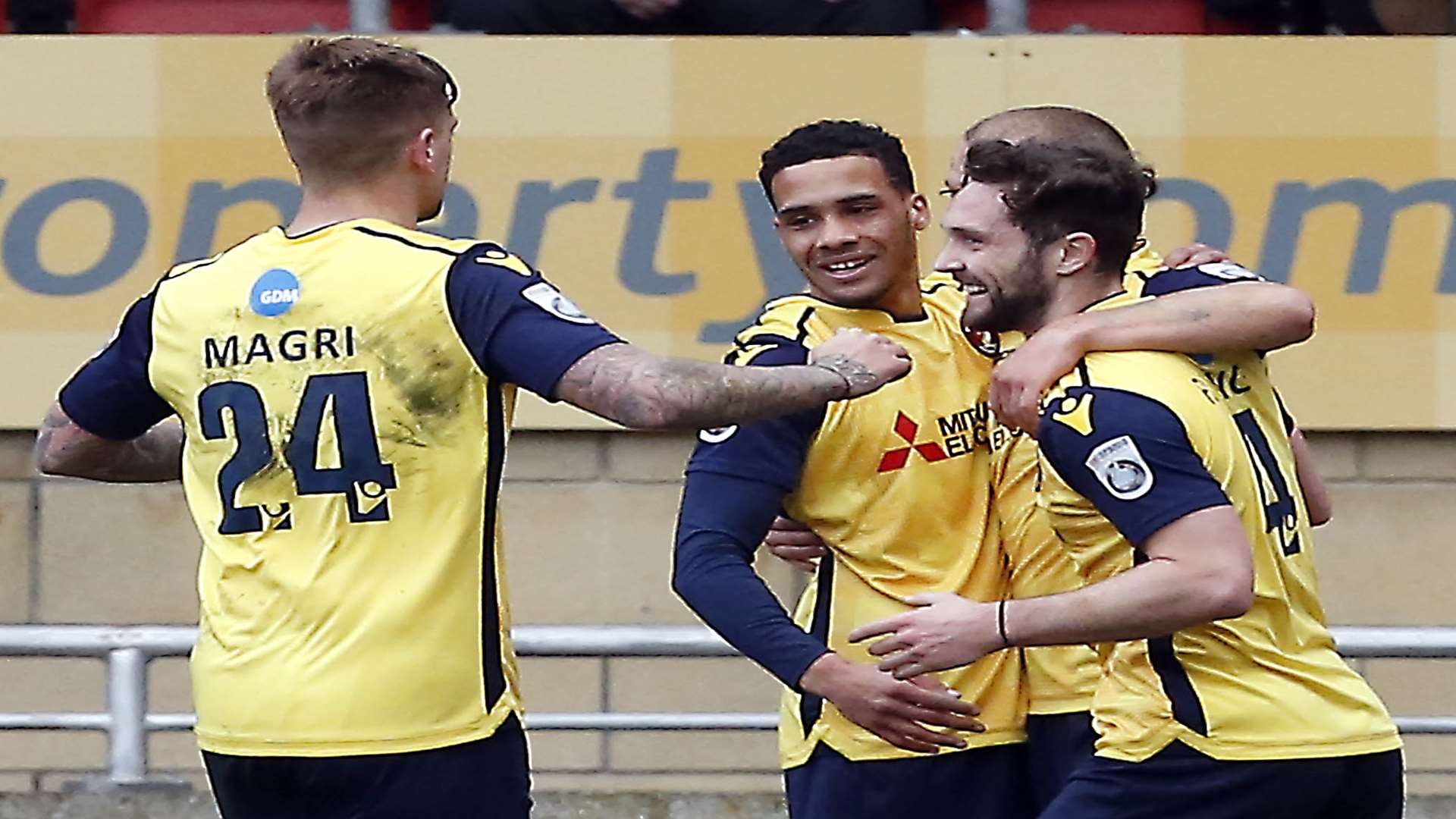 Corey Whitely celebrates with his team-mates after scoring for Ebbsfleet at Leyton Orient Picture: Simon O'Connor