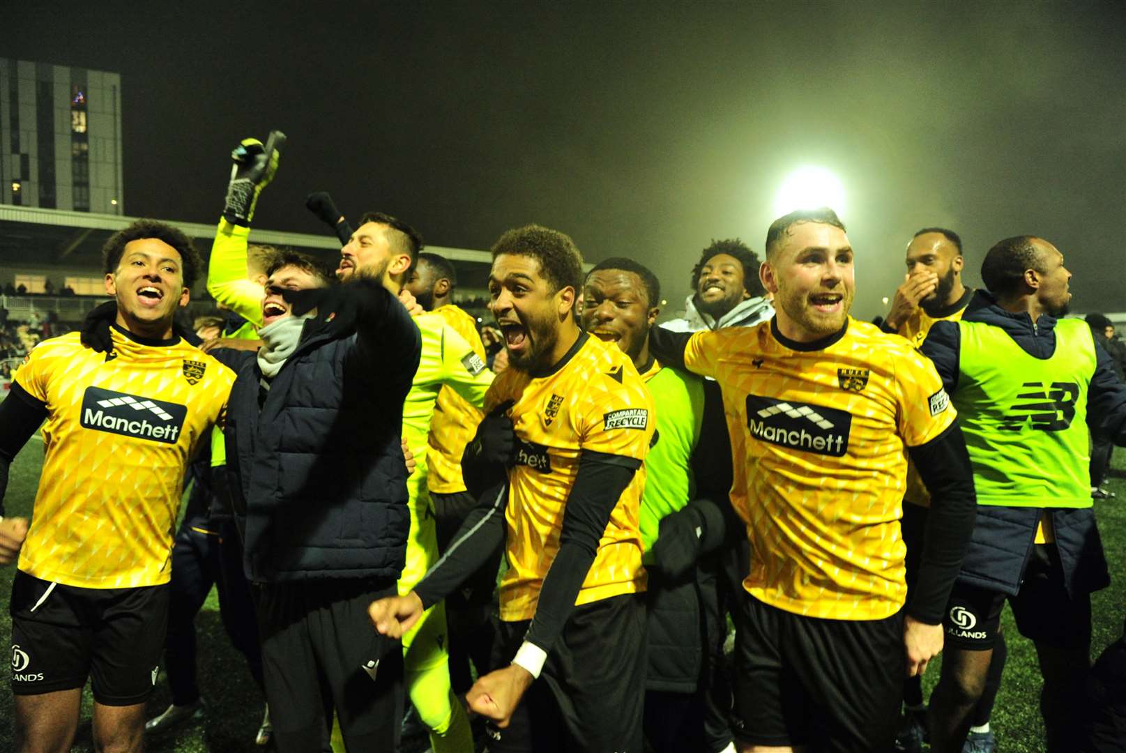 Maidstone players celebrate their FA Cup victory over Barrow. Picture: Steve Terrell