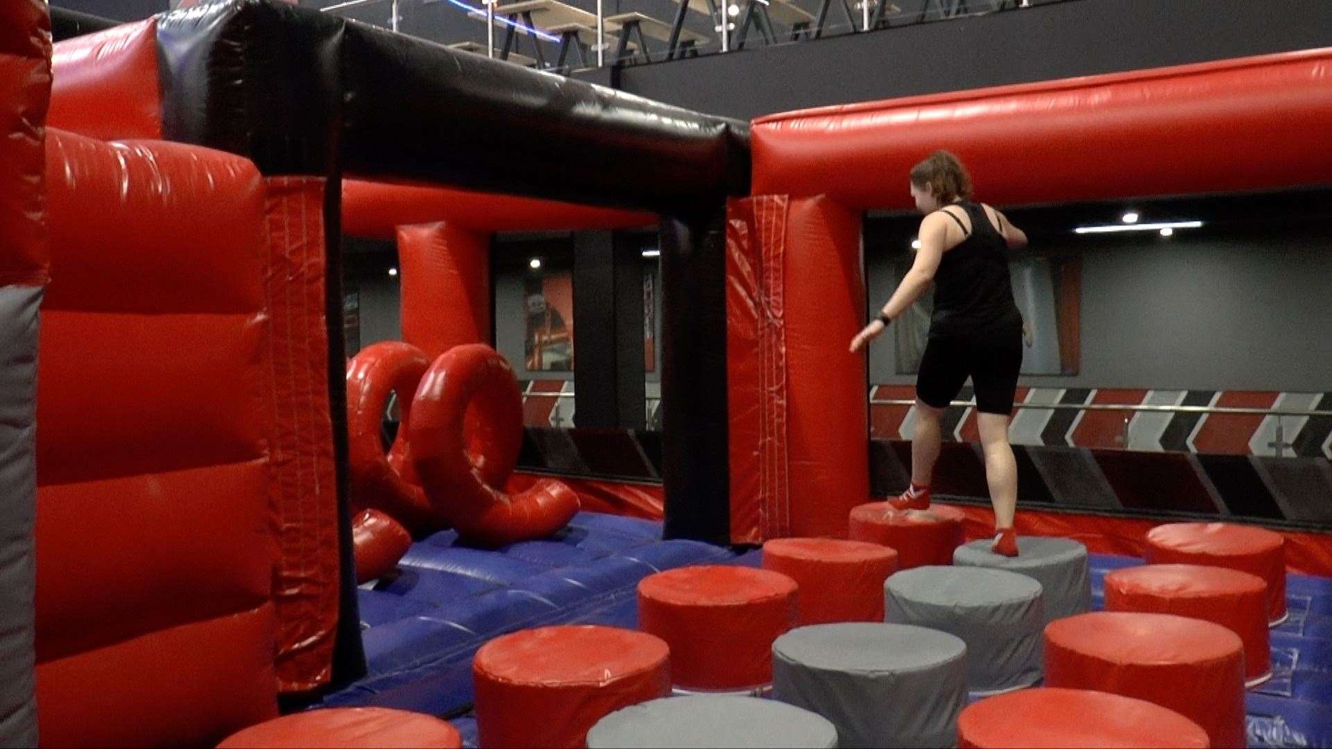 Megan on the inflatable obstacle course