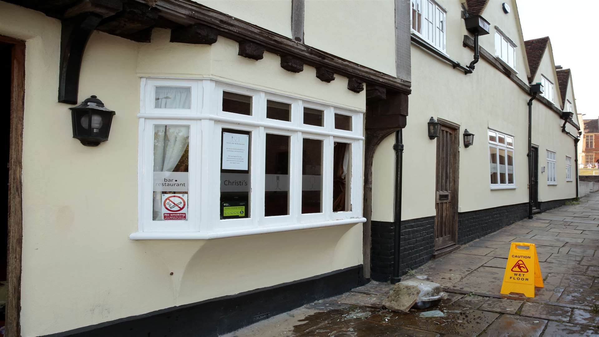 A barrel of cooking oil was launched through a window at the front of the building