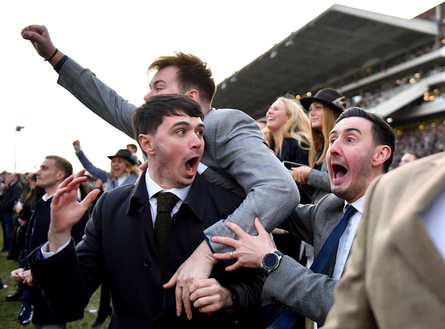 Racegoers during day four of the Cheltenham Festival at Cheltenham Racecourse in March (Jacob King/PA)