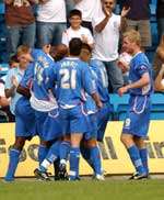 Gillingham celebrate Ian Cox's opener. Picture: BARRY GOODWIN