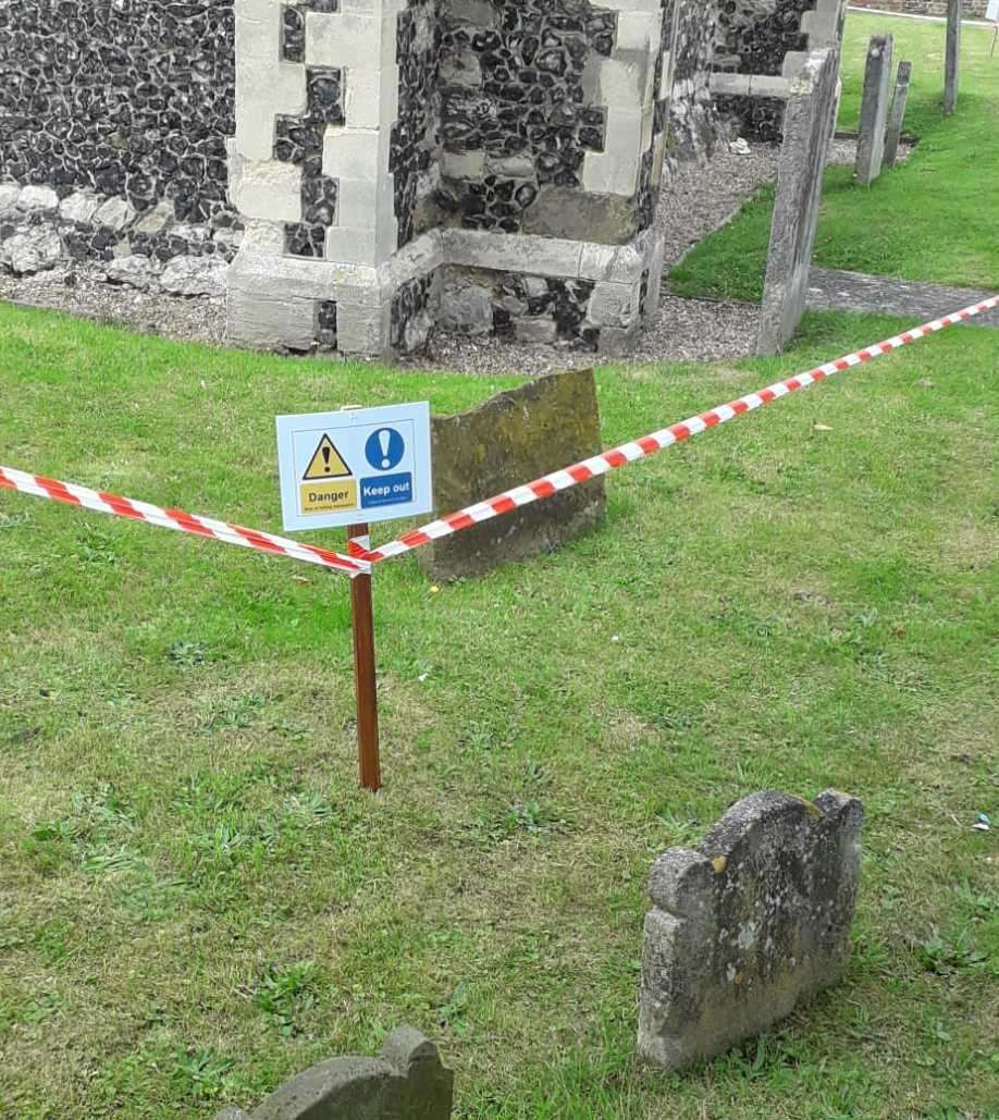 The churchyard around the unstable bricks has been cordoned off