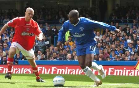 Konchesky battling it out with Chelsea's Geremi last season. Picture: MATT WALKER.