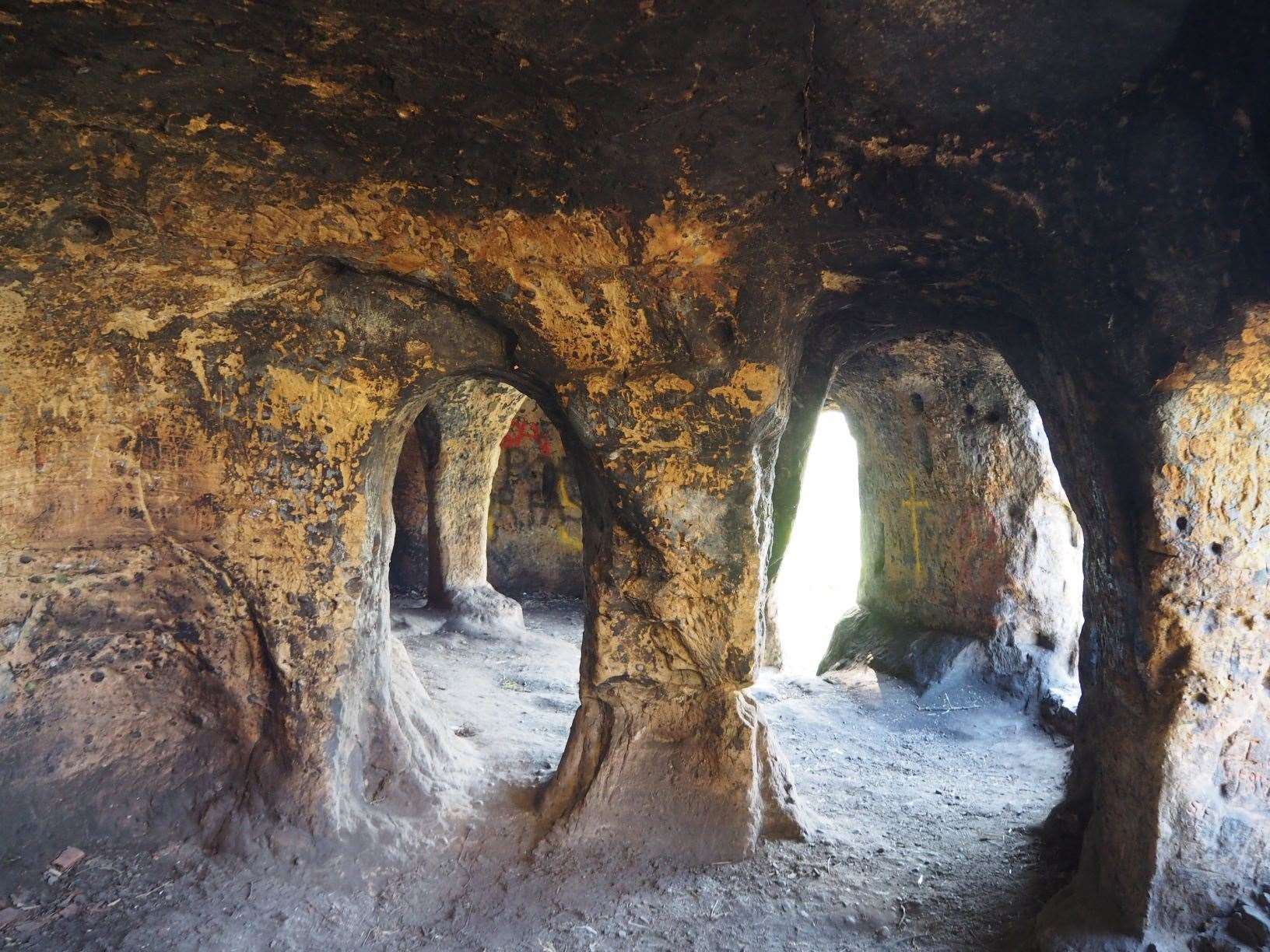 The interior shows early doors and pillars which survived walls being partially knocked through in the 18th century (Edmund Simons/RAU)