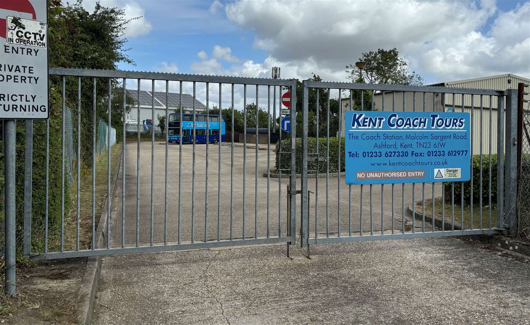 The now-closed gates of Kent Coach Tours in Malcolm Sargent Road