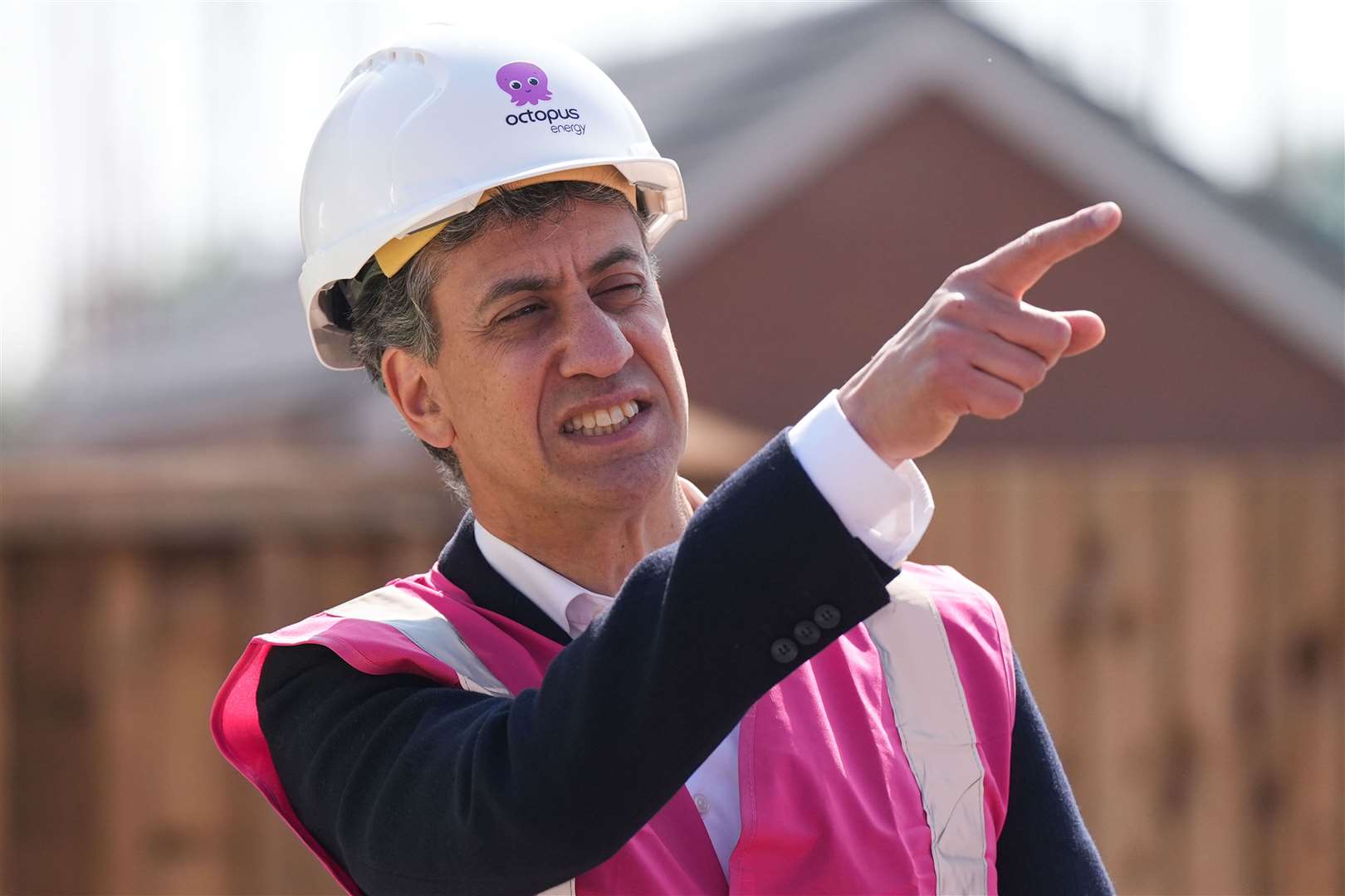 Shadow secretary of state for energy security and net zero Ed Miliband’s pretty in pink (hi-vis) as he checks out a ‘zero bills’ home in Stafford with Octopus Energy (Jacob King/PA)