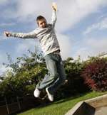 Onwards and upwards: Matthew Leech - a pupil at Greenacre School, Chatham - seems pleased with his results! Picture: Peter Still