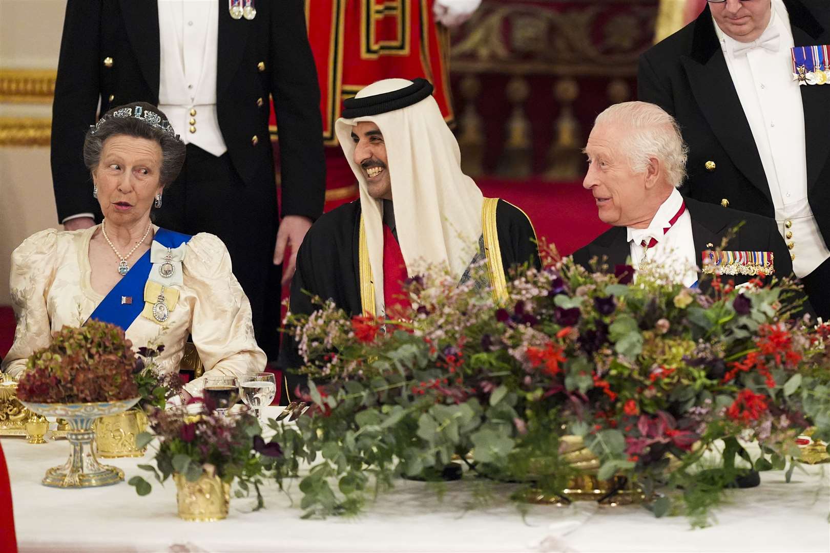 The King with the Emir of Qatar Sheikh Tamim bin Hamad Al Thani and the Princess Royal during the banquet (Jordan Pettitt/PA)