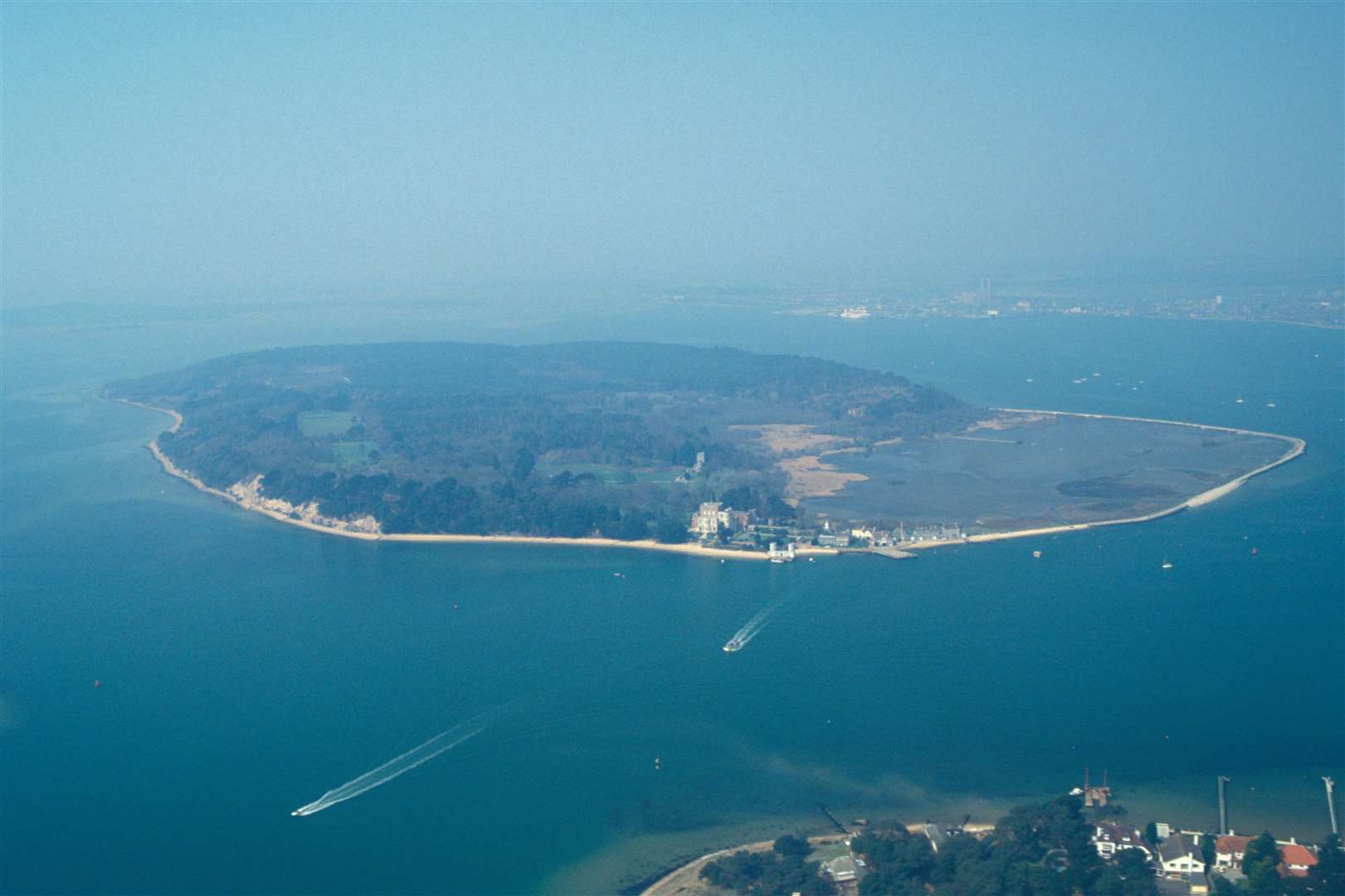 There were reports of oil deposits washing up on the west and north shorelines on Brownsea Island in Poole Harbour (Alamy/PA)