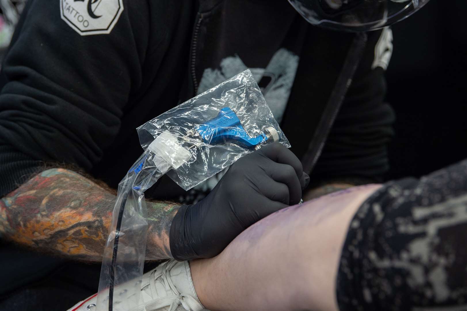 Tattoo studios will soon be allowed to reopen (Joe Giddens/PA)